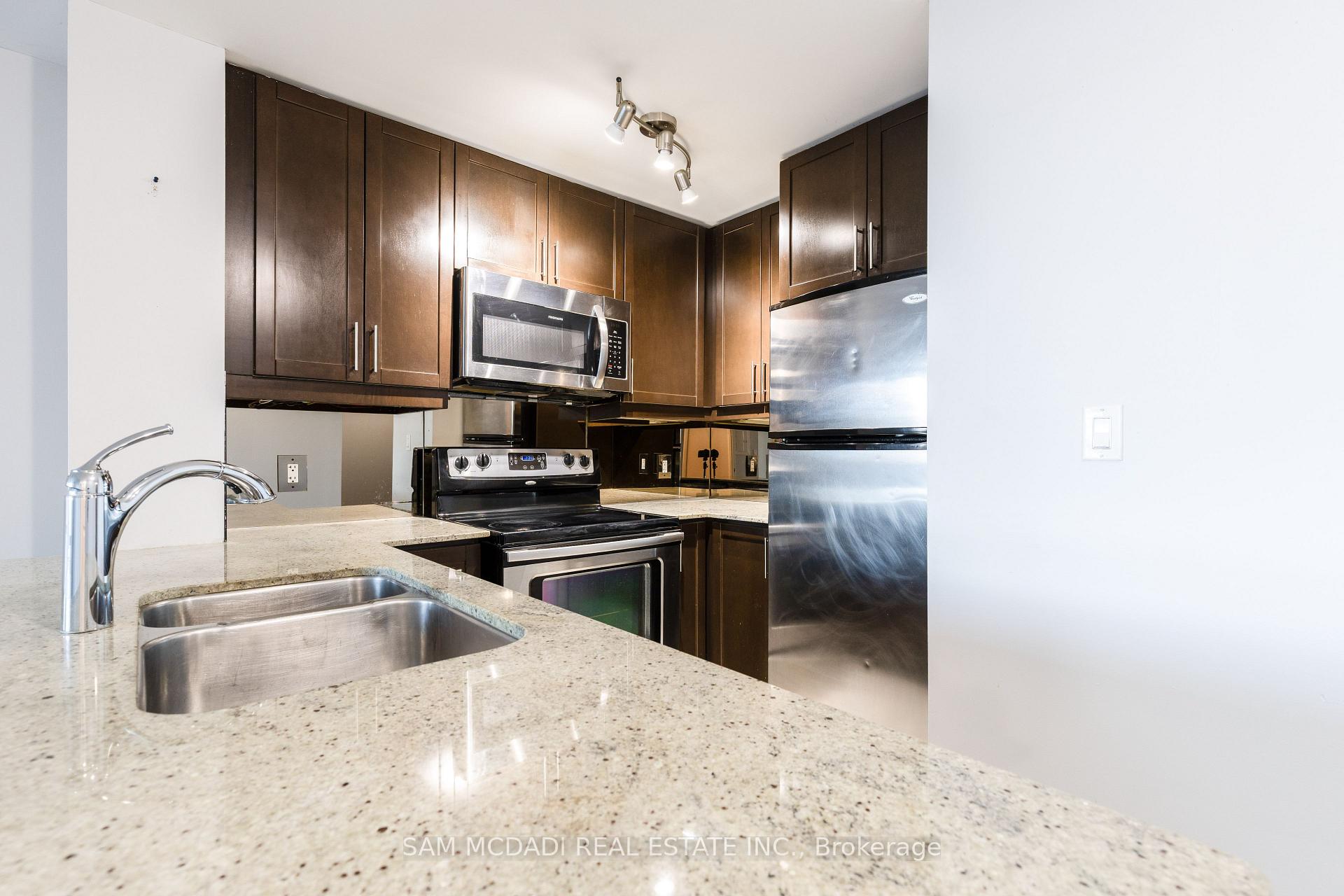 Photo 6 of Unit 310, 70 Absolute Avenue, Mississauga, City Centre — HOMEH