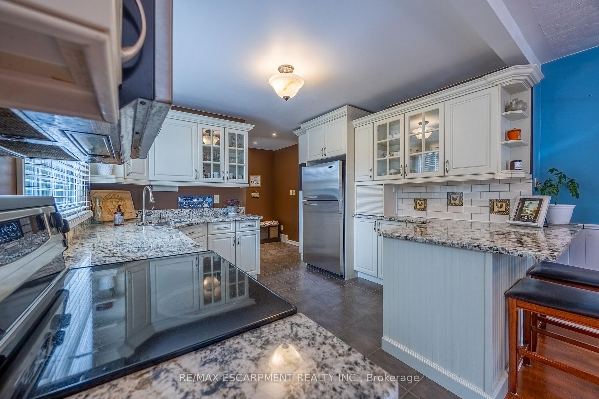 Photo 12 of 30 Gibson Drive, Norfolk, Simcoe — HOMEH