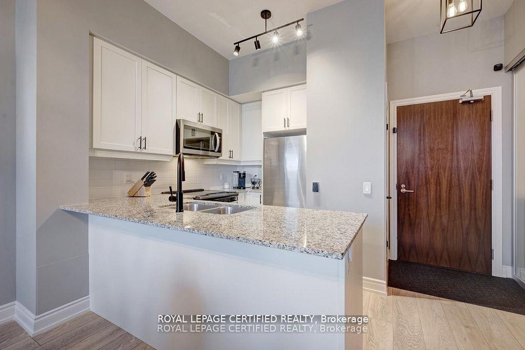 Photo 6 of Unit 114, 1050 Main Street E, Milton, Dempsey — HOMEH