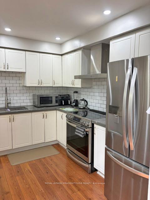 Photo 13 of Unit 7, 26 Red Haven Drive, Grimsby, Grimsby Beach — HOMEH
