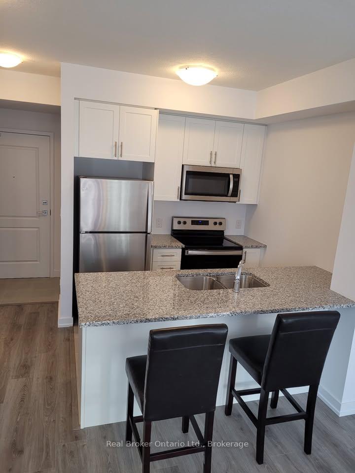 Photo 2 of Unit 221, 450 Dundas Street E, Hamilton, Waterdown — HOMEH