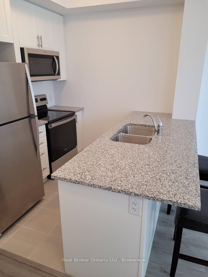 Photo 3 of Unit 221, 450 Dundas Street E, Hamilton, Waterdown — HOMEH
