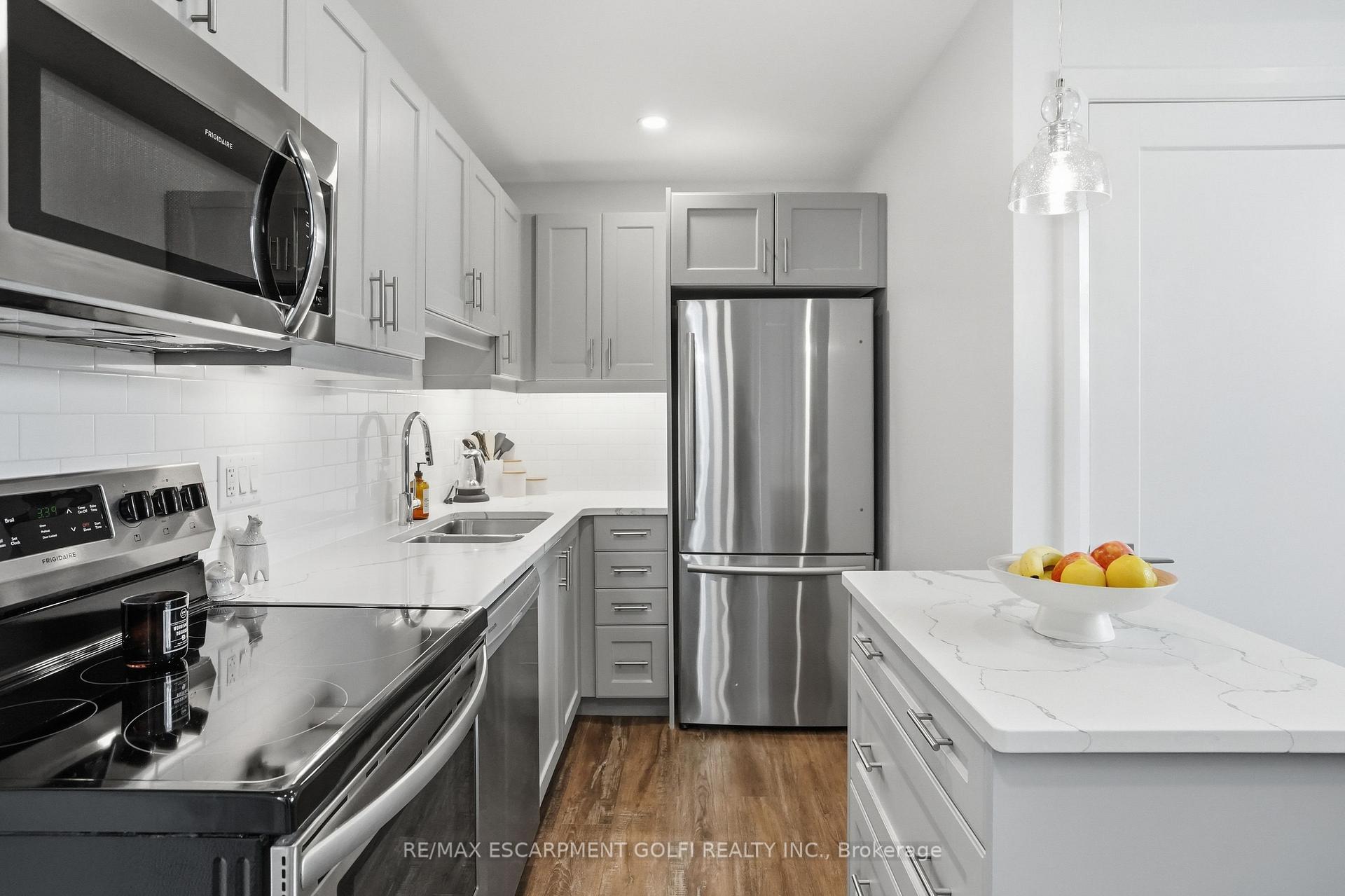 Photo 3 of Unit 8, 405 Merritt Street, St. Catharines, Oakdale — HOMEH