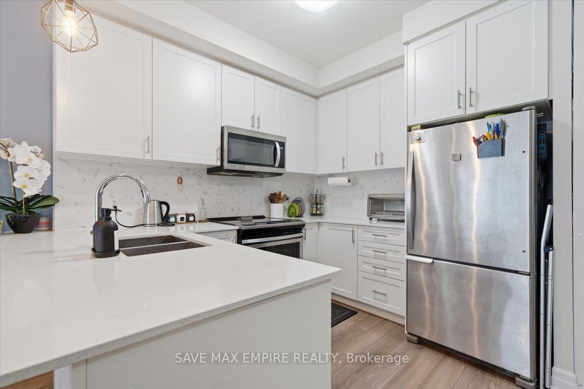 Photo 8 of Unit 227, 652 Cricklewood Drive, Mississauga, Mineola — HOMEH