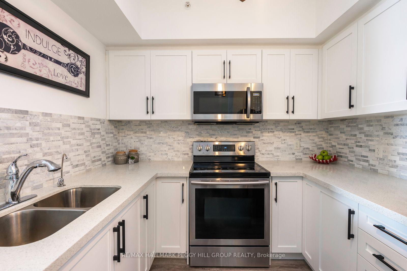 Photo 2 of Unit 410, 100 Dean Avenue, Barrie, Painswick South — HOMEH