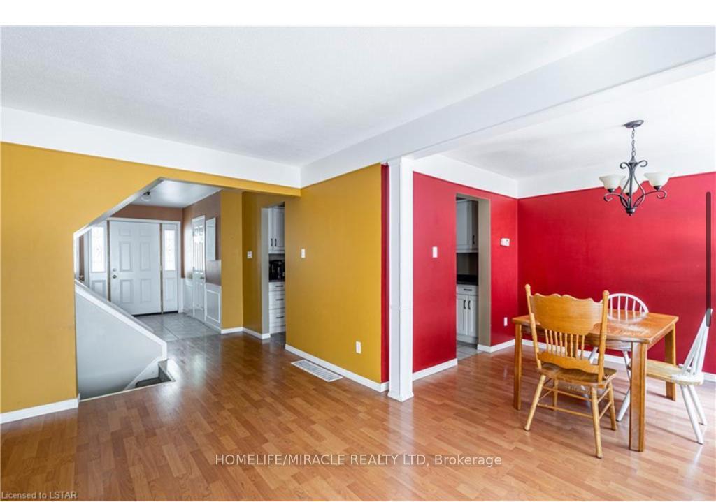 Photo 3 of Unit 12, 669 Osgoode Drive, London, South Y — HOMEH