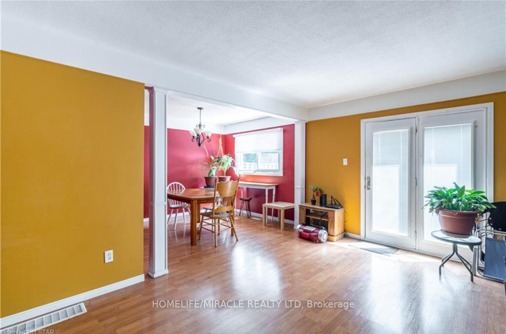 Photo 5 of Unit 12, 669 Osgoode Drive, London, South Y — HOMEH