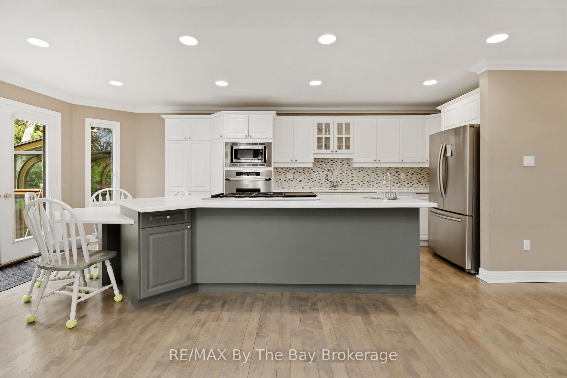 Photo 20 of 70 Fairway Crescent, Wasaga Beach — HOMEH