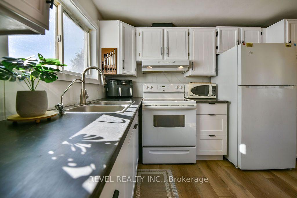 Photo 16 of 102 Notre Dame Place, Timmins, MTJ - Trailer Parks — HOMEH