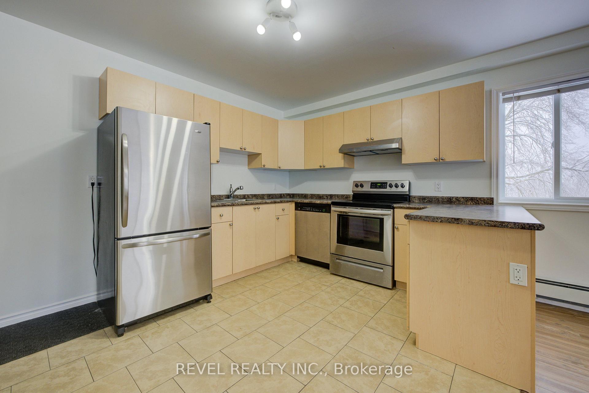 Photo 3 of Unit 2, 20 Puleston Street, Brantford, East Ward — HOMEH
