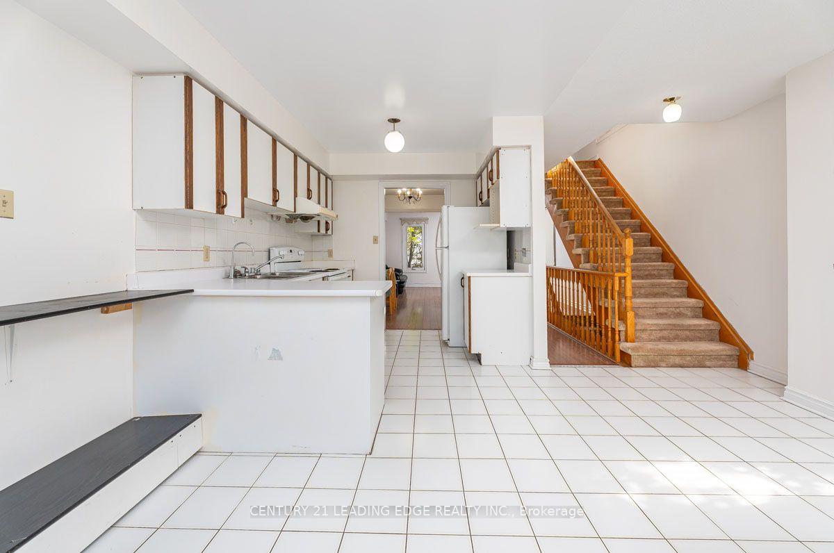 Photo 8 of Unit 1, 3 Reidmount Avenue, Scarborough, Agincourt South-Malvern West — HOMEH