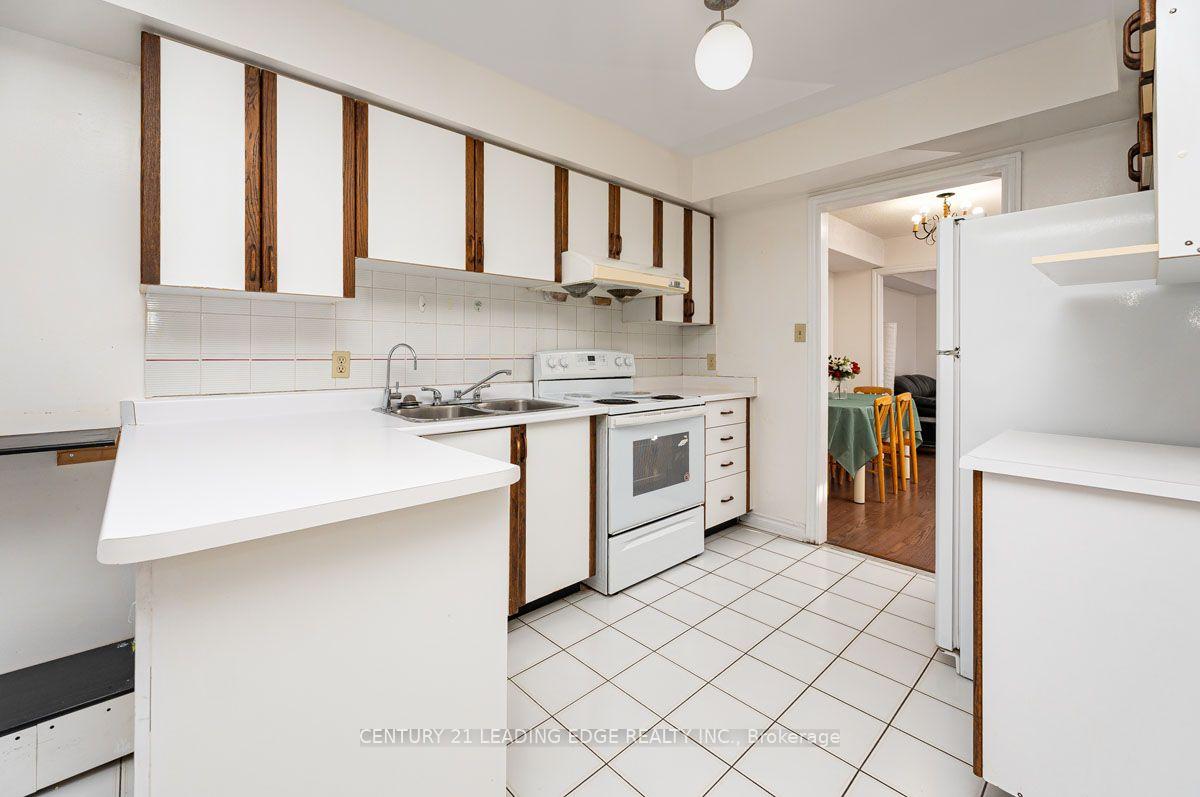 Photo 12 of Unit 1, 3 Reidmount Avenue, Scarborough, Agincourt South-Malvern West — HOMEH