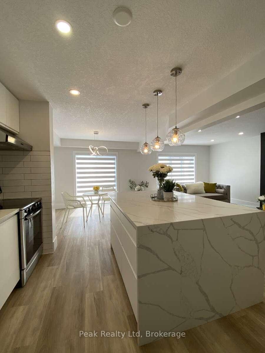 Photo 3 of 125 Steepleridge Street, Kitchener, Doon South — HOMEH