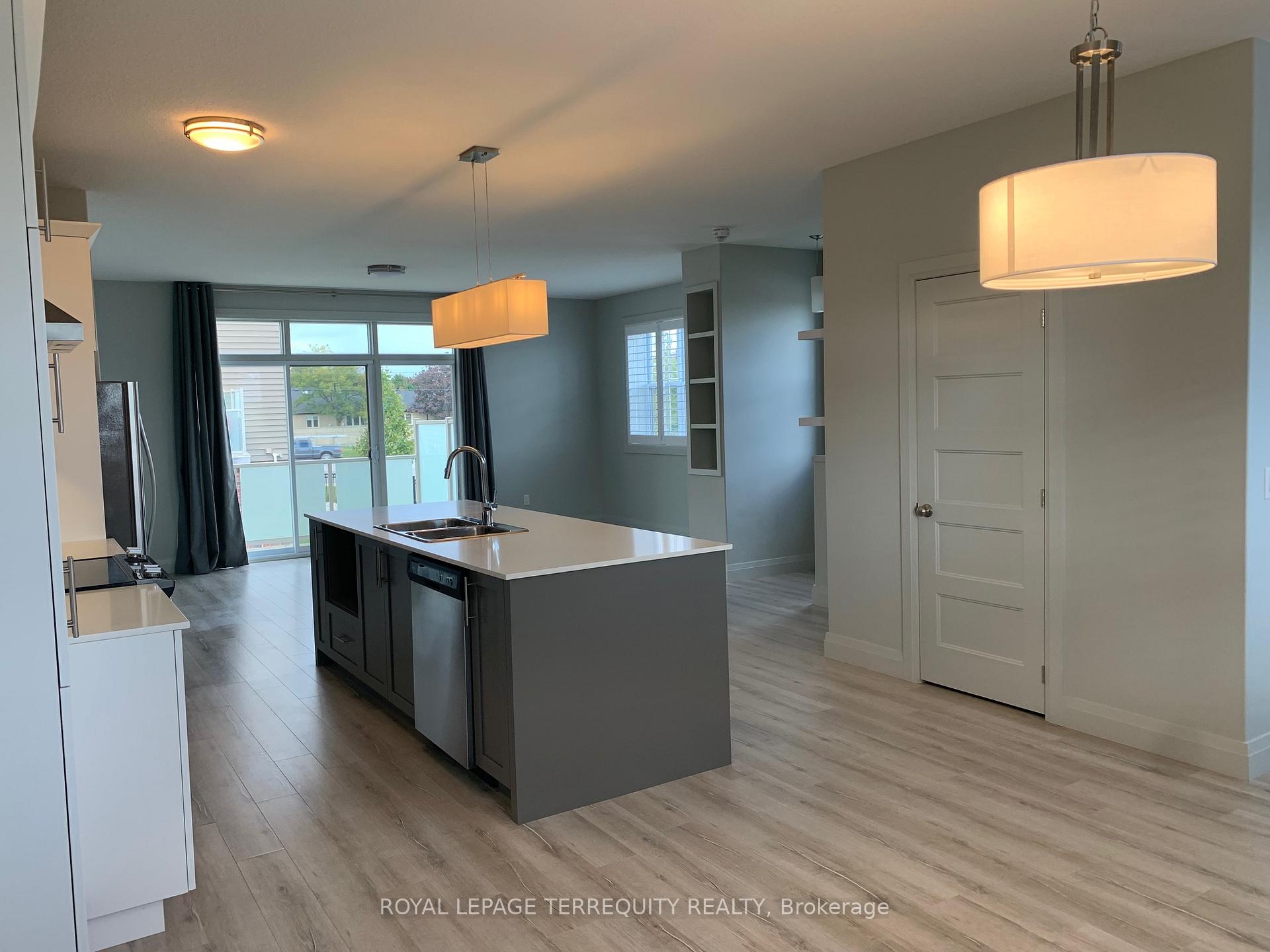 Photo 2 of Unit 2, 3025 Singleton Avenue, London, South W — HOMEH