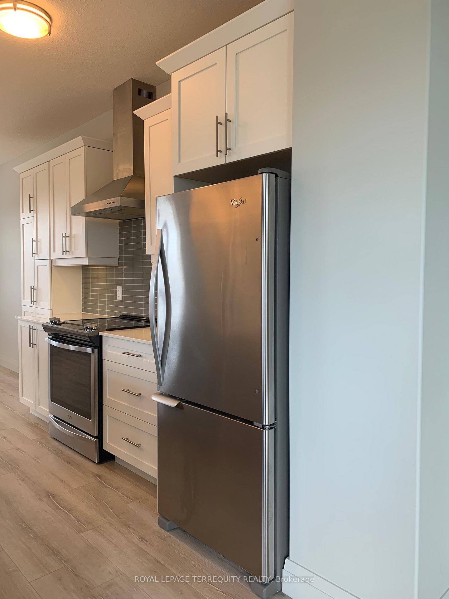 Photo 7 of Unit 2, 3025 Singleton Avenue, London, South W — HOMEH