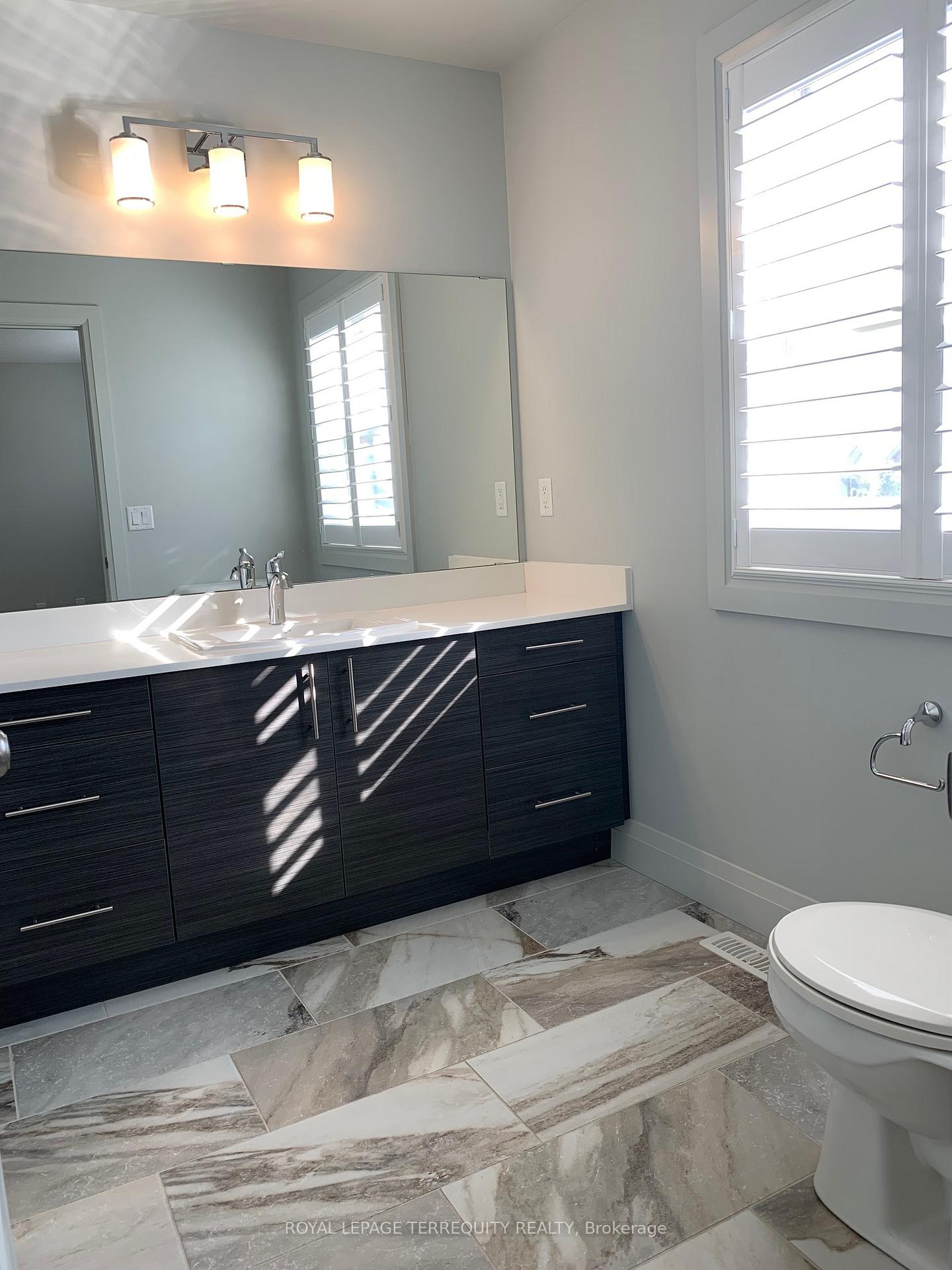 Photo 17 of Unit 2, 3025 Singleton Avenue, London, South W — HOMEH