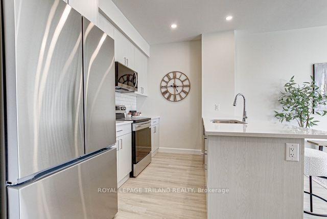 Photo 3 of Unit 307, 75 Walnut Street, St. Thomas — HOMEH