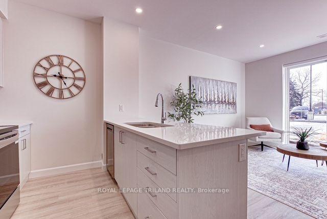 Photo 4 of Unit 307, 75 Walnut Street, St. Thomas — HOMEH