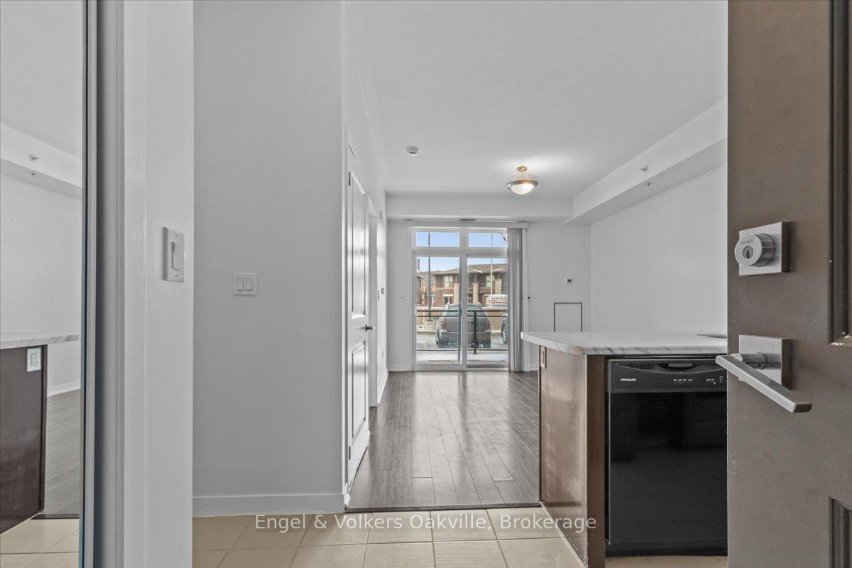 Photo 3 of Unit 135, 5010 Corporate Drive, Burlington, Uptown — HOMEH