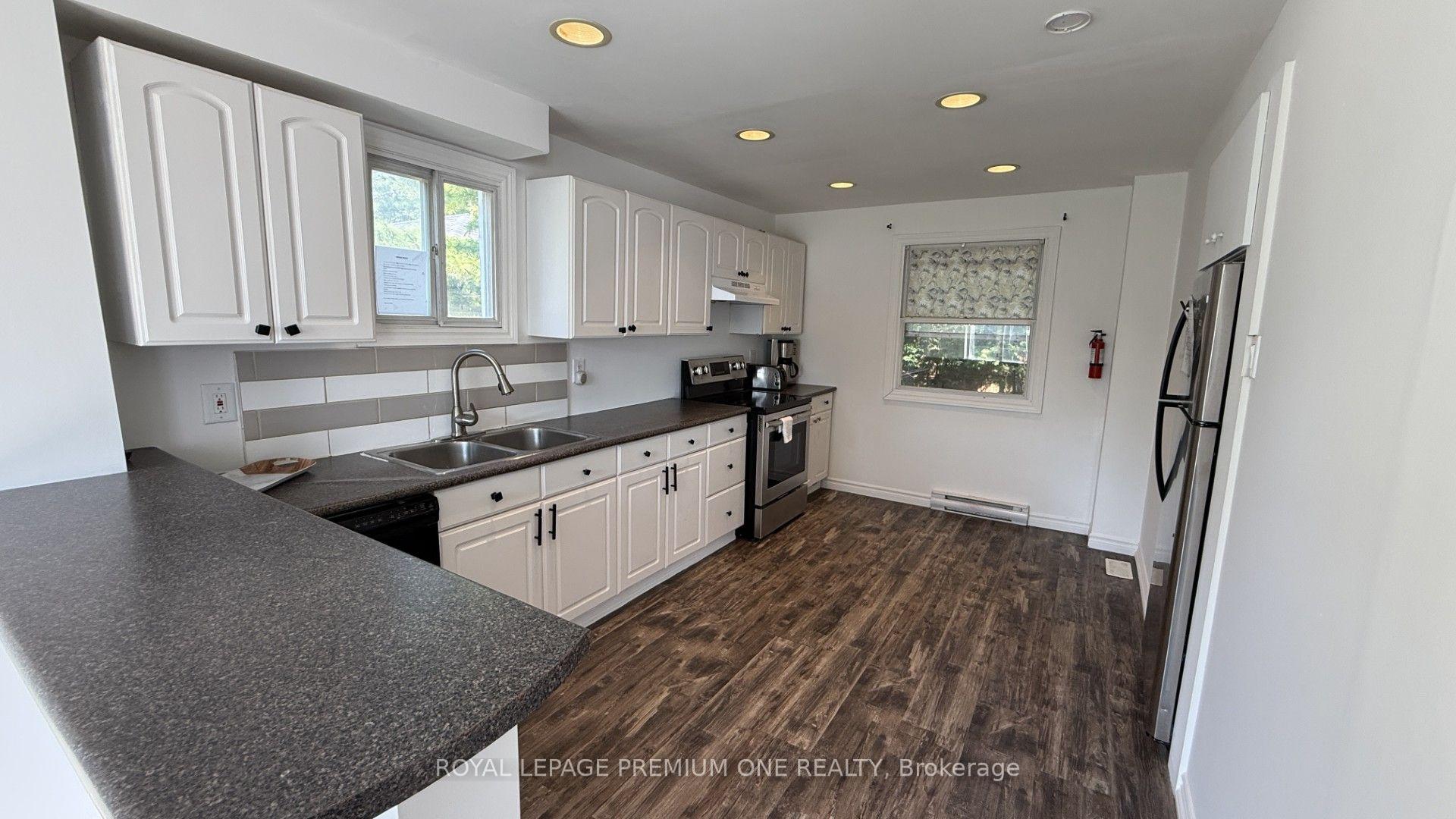 Photo 4 of Unit UNIT A, 512 Mosley Street, Wasaga Beach — HOMEH