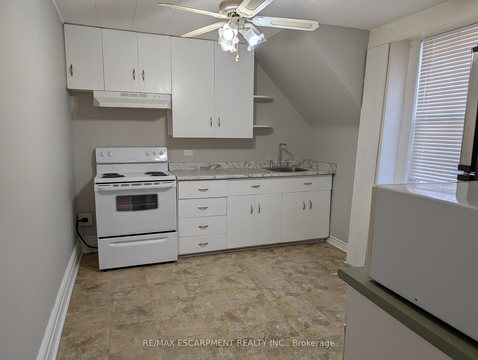 Photo 4 of Unit Upper, 12 East 24th Street, Hamilton, Eastmount — HOMEH