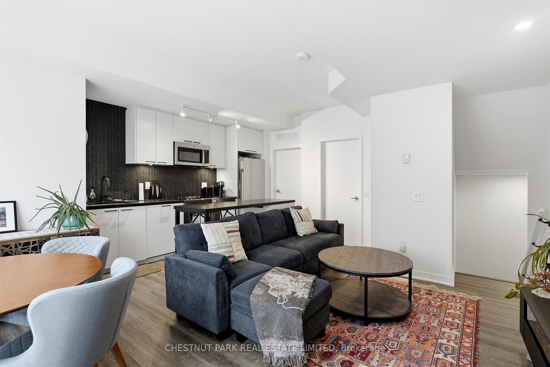 Photo 2 of Unit TH12, 20 Ed Clark Gardens, Toronto, Weston-Pellam Park — HOMEH