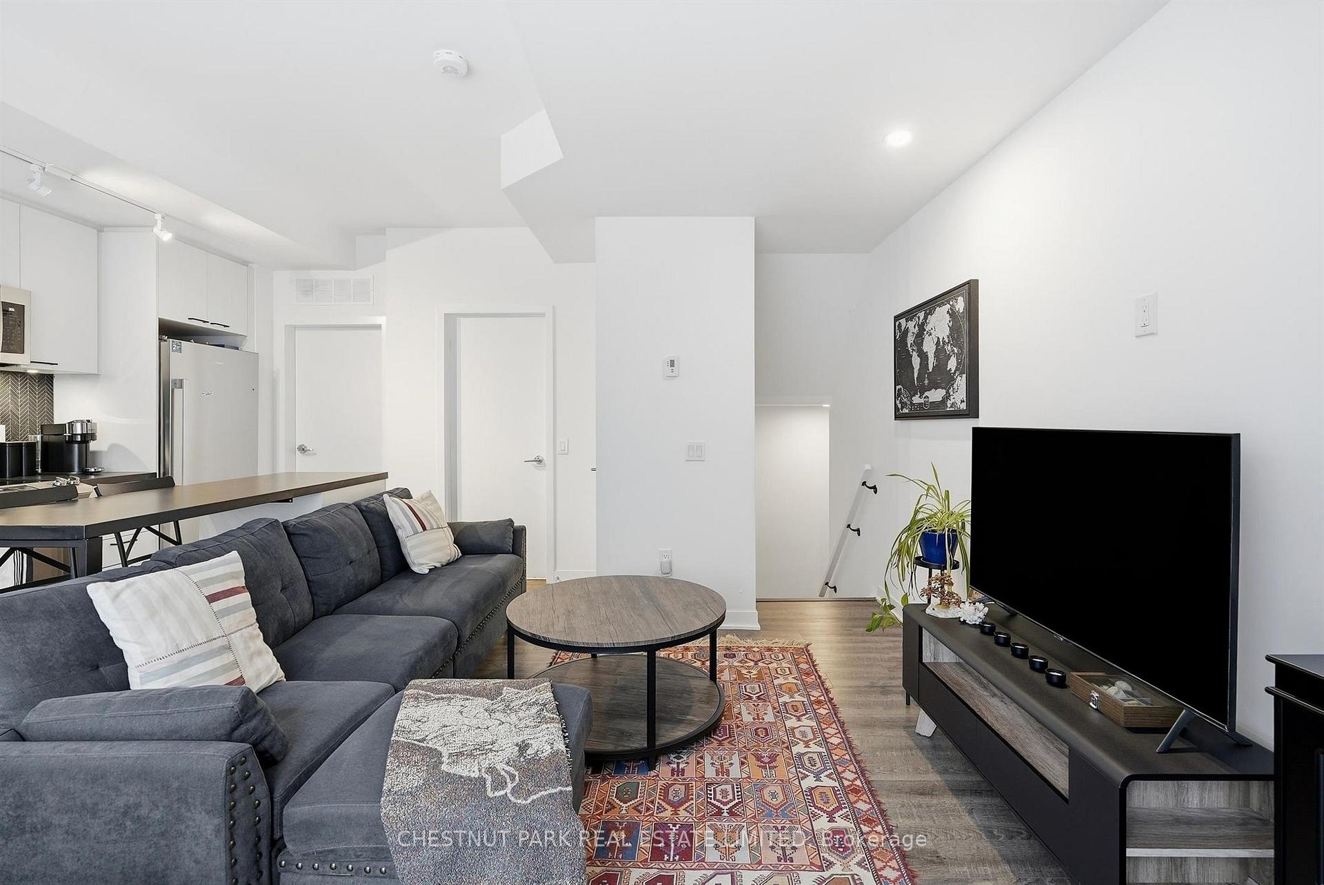 Photo 5 of Unit TH12, 20 Ed Clark Gardens, Toronto, Weston-Pellam Park — HOMEH