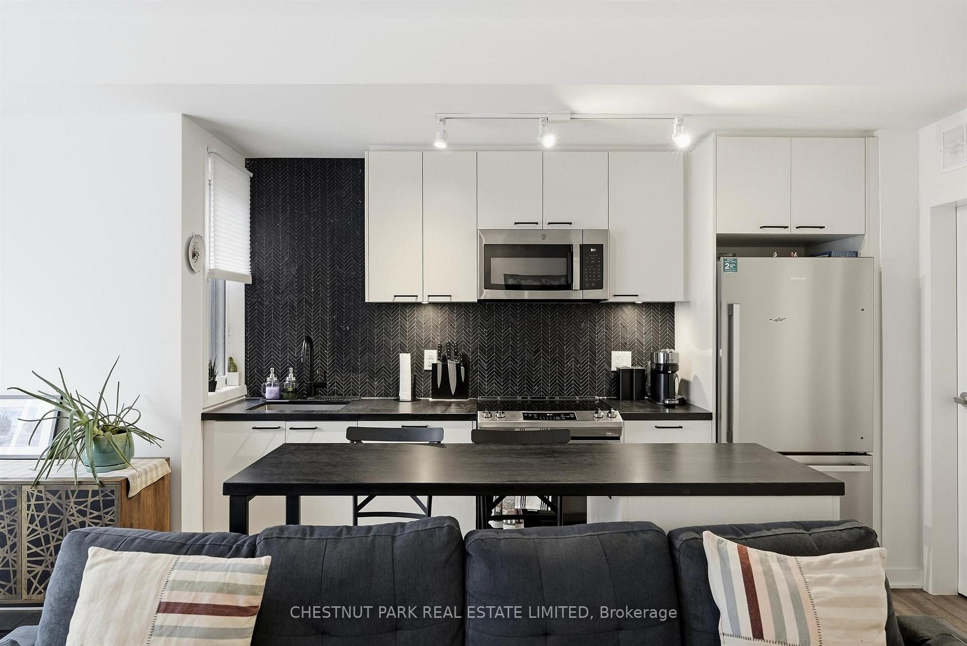 Photo 11 of Unit TH12, 20 Ed Clark Gardens, Toronto, Weston-Pellam Park — HOMEH