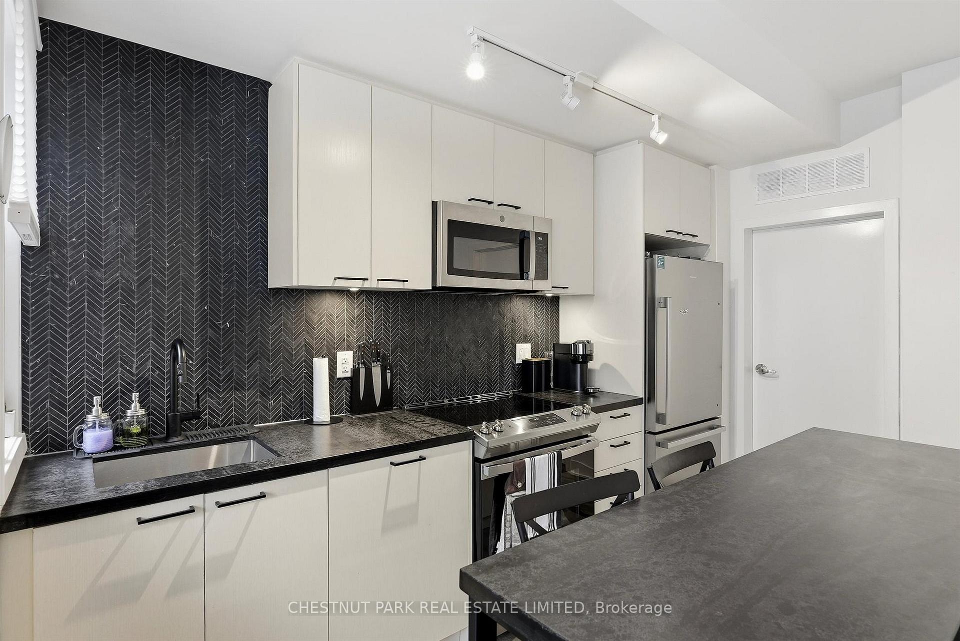 Photo 12 of Unit TH12, 20 Ed Clark Gardens, Toronto, Weston-Pellam Park — HOMEH