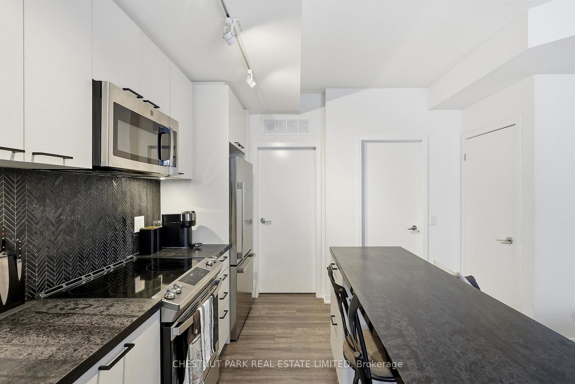 Photo 13 of Unit TH12, 20 Ed Clark Gardens, Toronto, Weston-Pellam Park — HOMEH