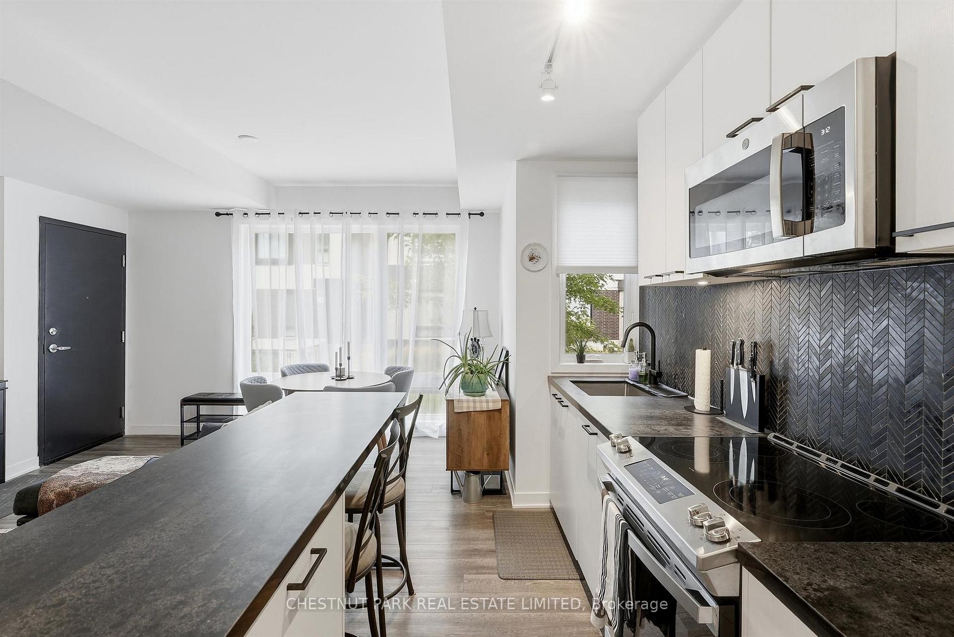 Photo 14 of Unit TH12, 20 Ed Clark Gardens, Toronto, Weston-Pellam Park — HOMEH