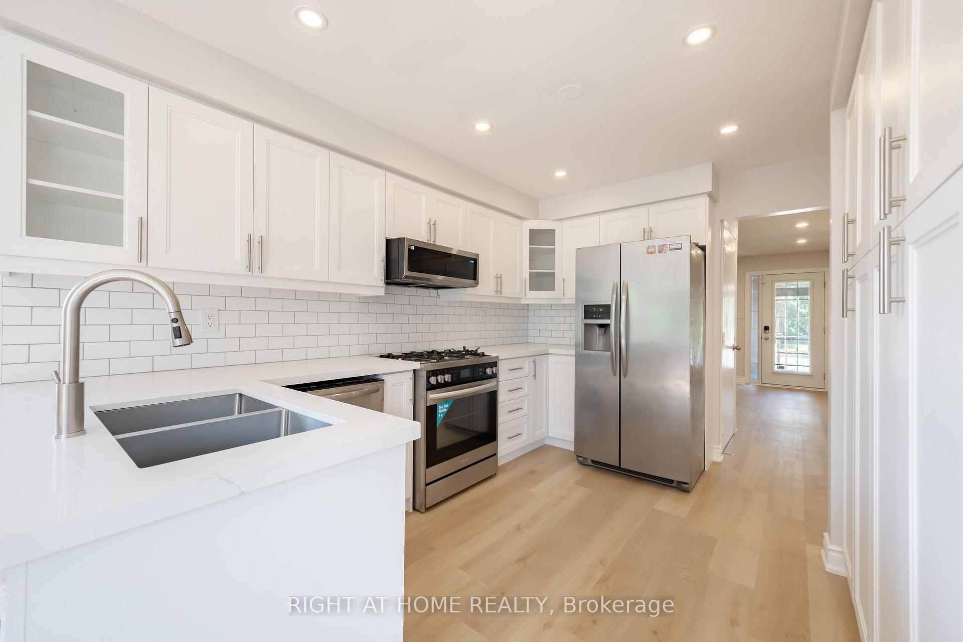 Photo 9 of 345 Mill Street S, Brampton, Brampton South — HOMEH
