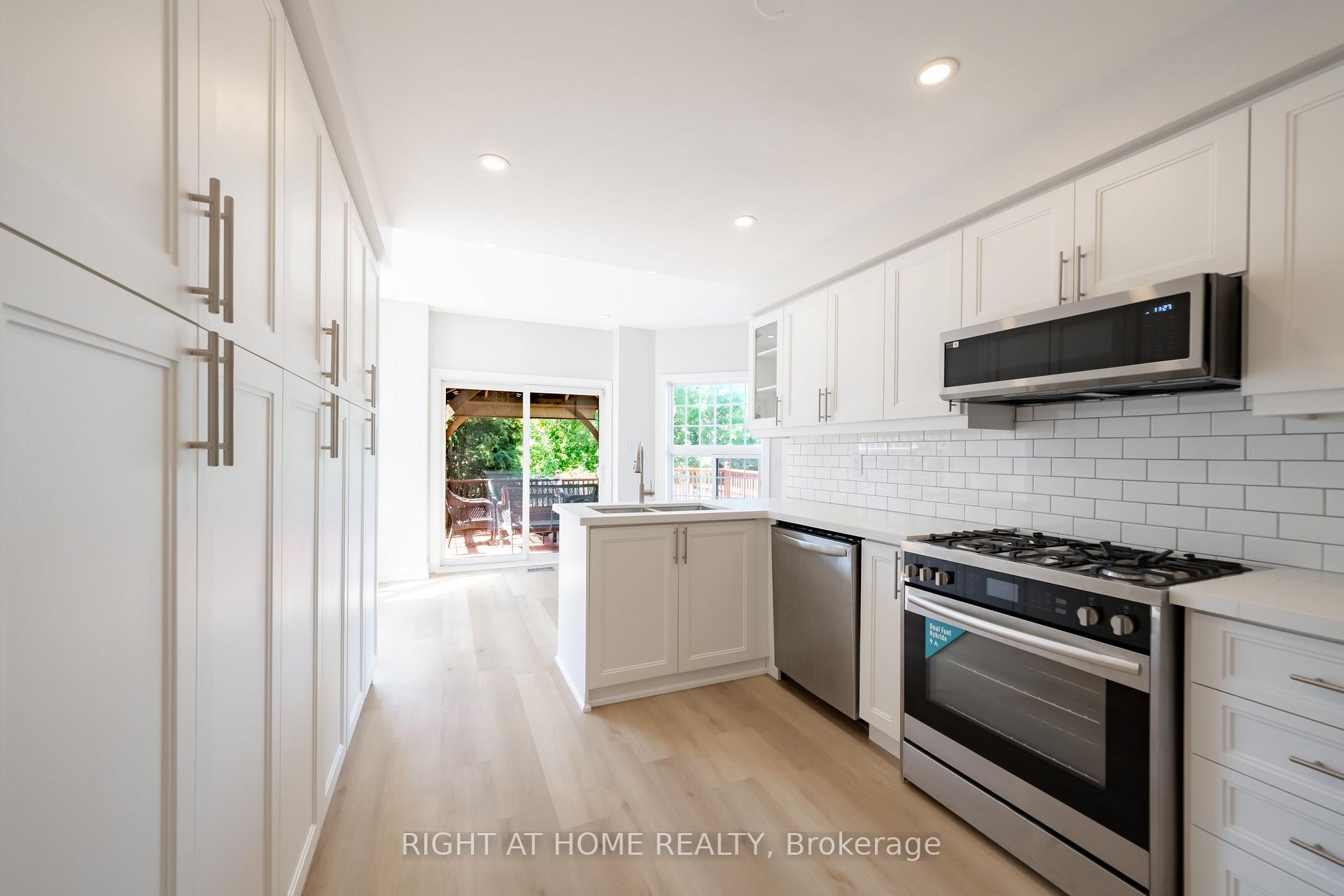 Photo 10 of 345 Mill Street S, Brampton, Brampton South — HOMEH