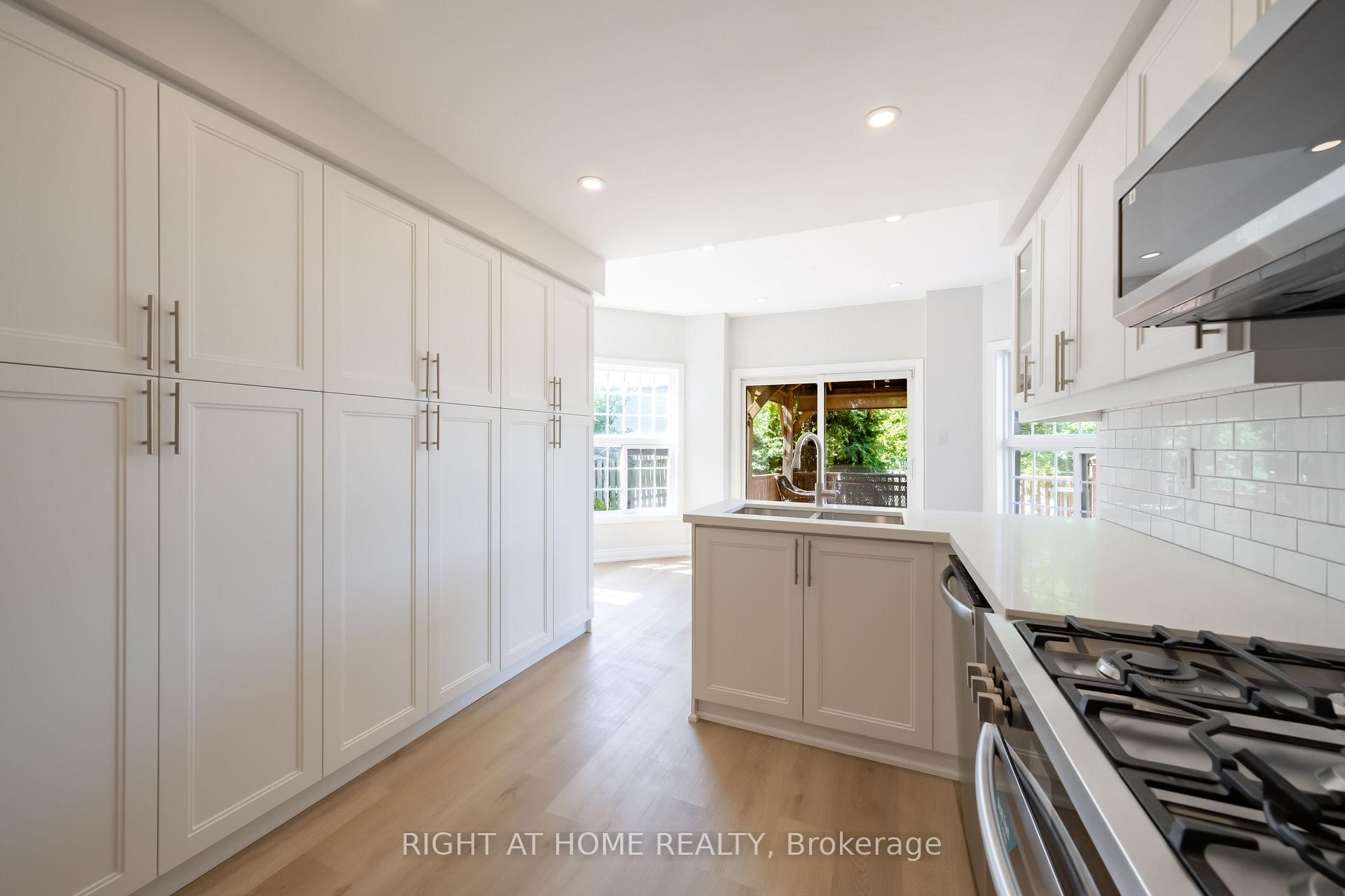 Photo 12 of 345 Mill Street S, Brampton, Brampton South — HOMEH