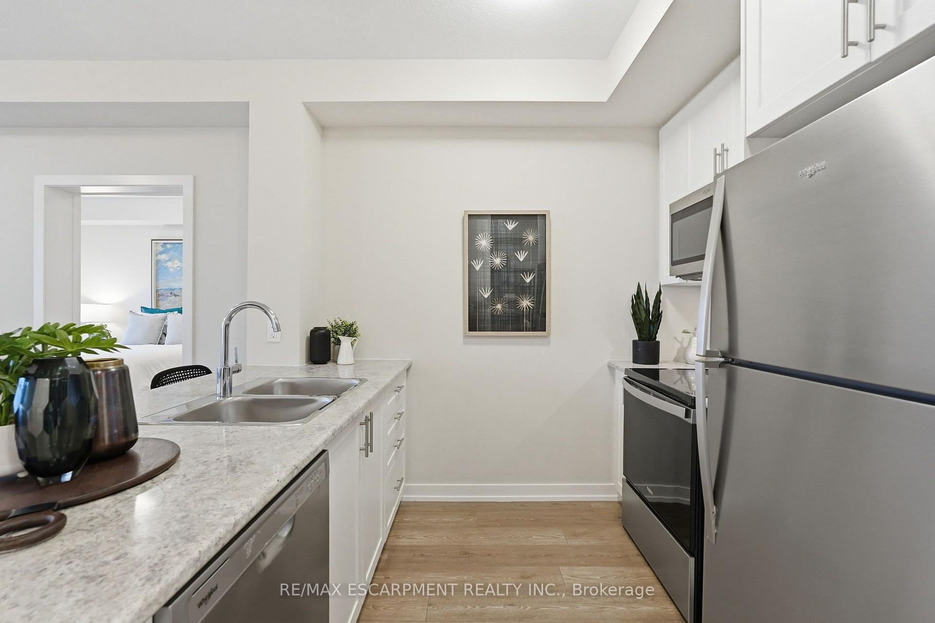 Photo 10 of Unit 416, 870 Queenston Road, Hamilton, Stoney Creek — HOMEH