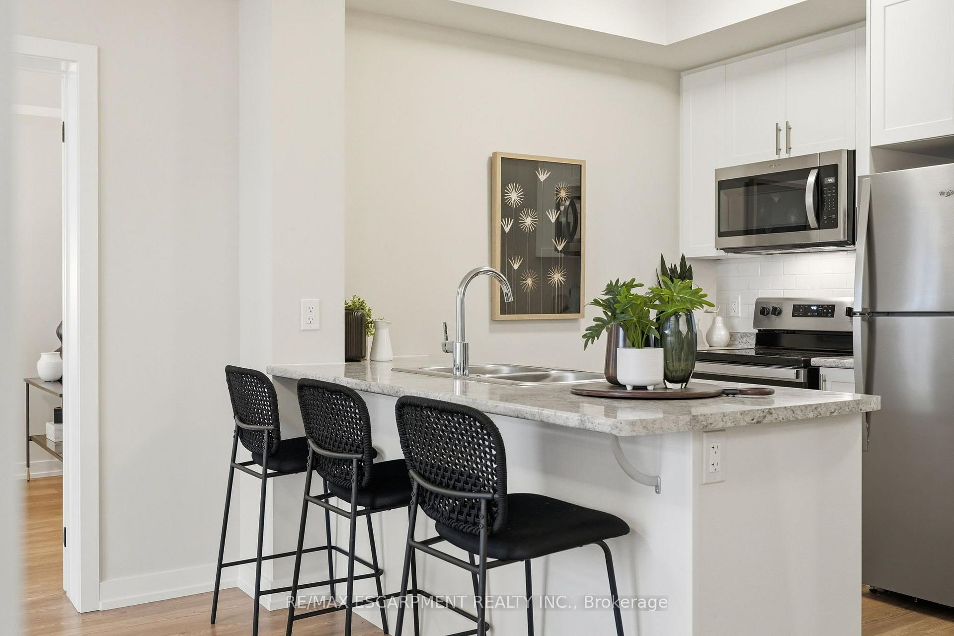 Photo 23 of Unit 416, 870 Queenston Road, Hamilton, Stoney Creek — HOMEH