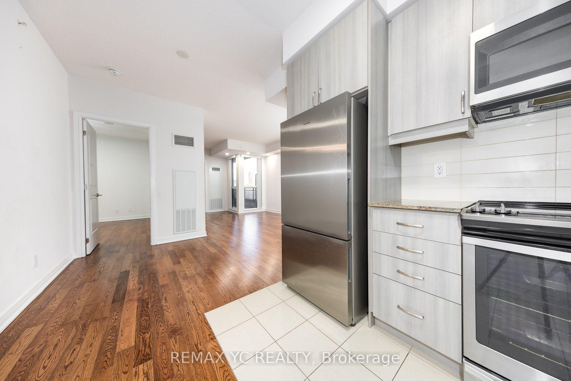 Photo 3 of Unit 201, 9191 Yonge Street, Richmond Hill, Langstaff — HOMEH