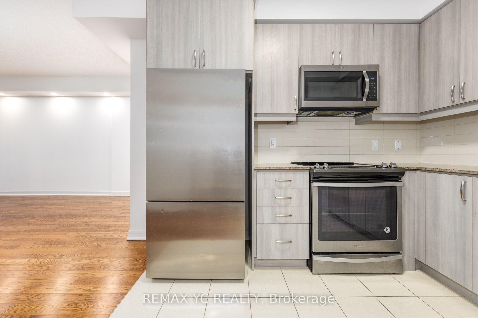 Photo 4 of Unit 201, 9191 Yonge Street, Richmond Hill, Langstaff — HOMEH