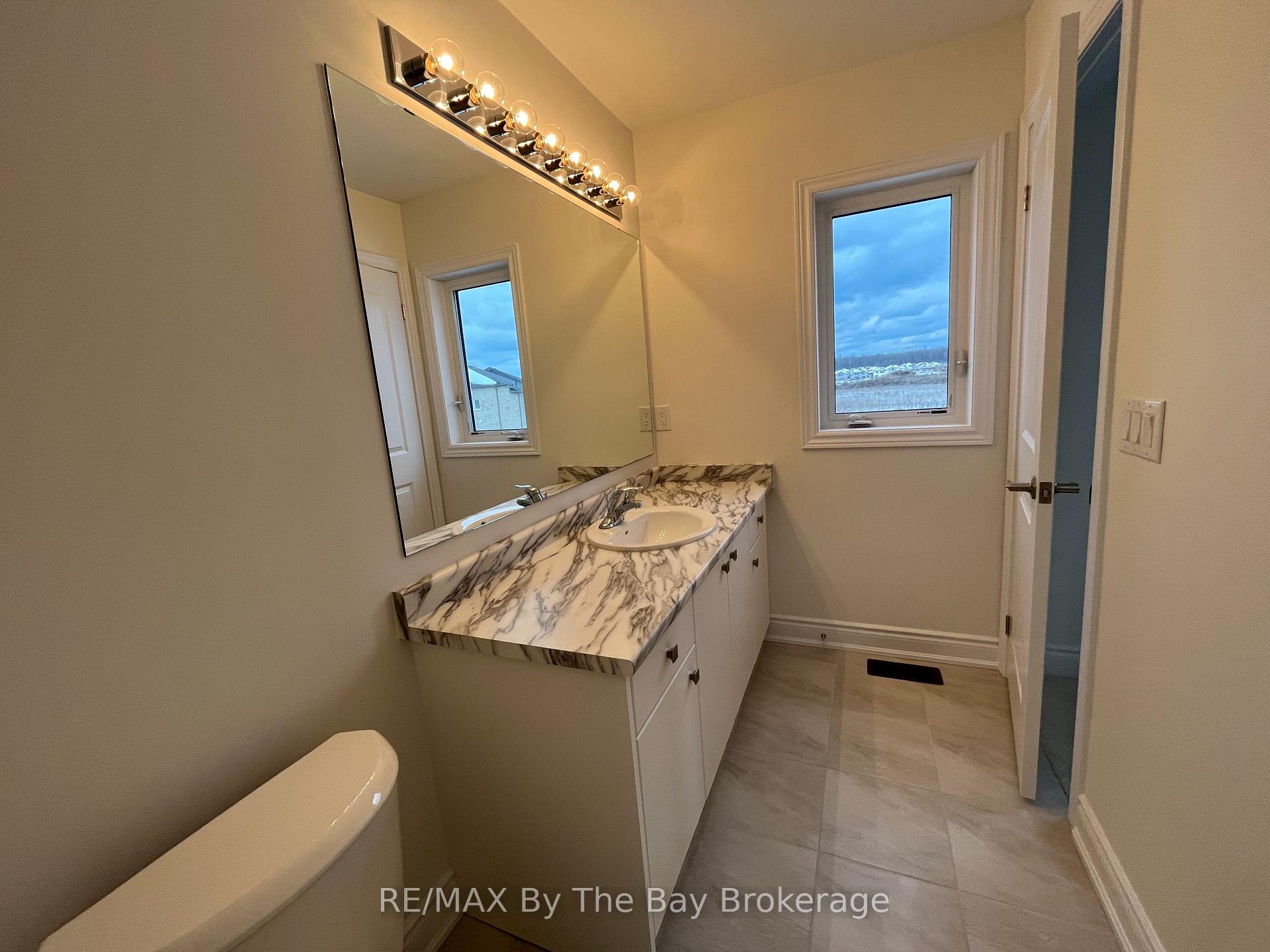 Photo 12 of 17 Carriage Lane, Wasaga Beach — HOMEH
