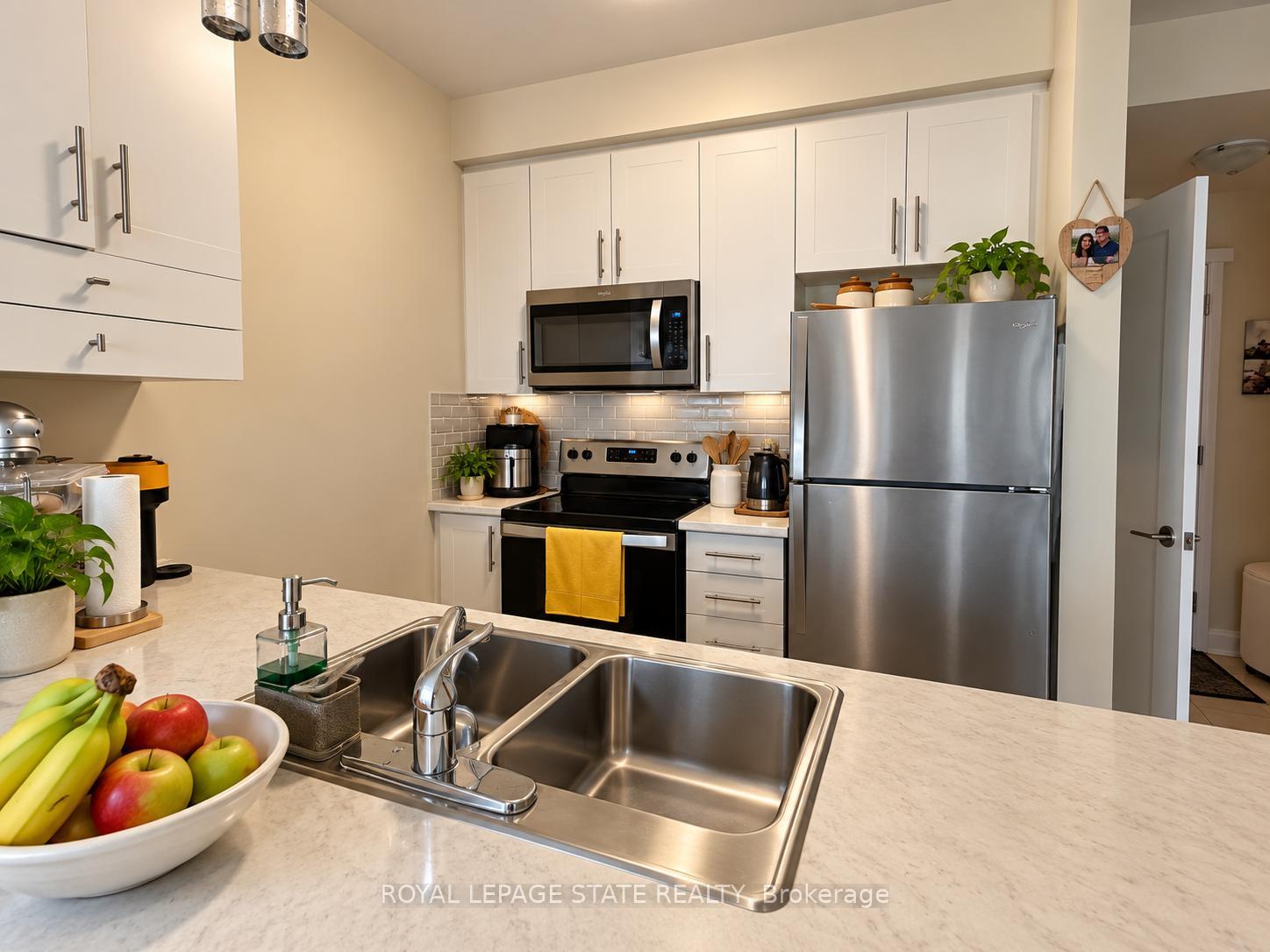 Photo 6 of Unit 427, 16 Concord Place, Grimsby, Grimsby Beach — HOMEH