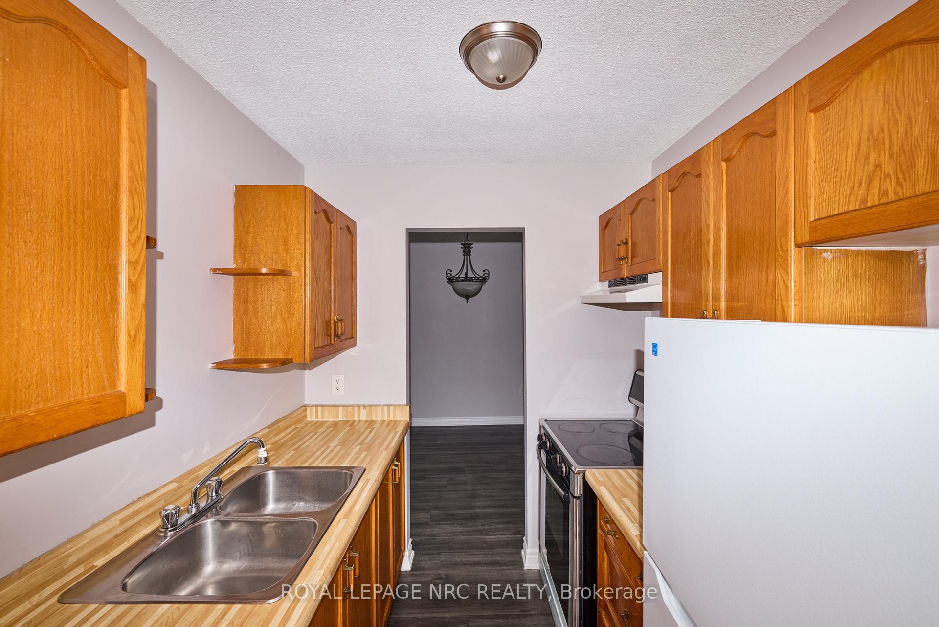 Photo 17 of Unit 11, 4839 Drummond Road, Niagara Falls, Morrison — HOMEH