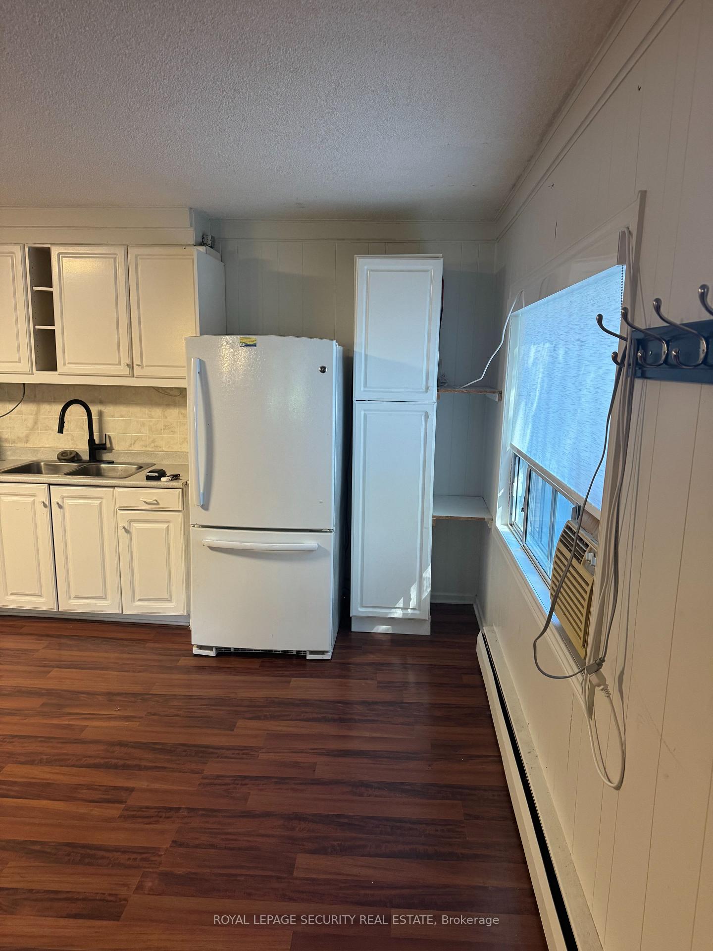 Photo 7 of Unit Lower B, 10432 Islington Avenue, Vaughan, Kleinburg — HOMEH