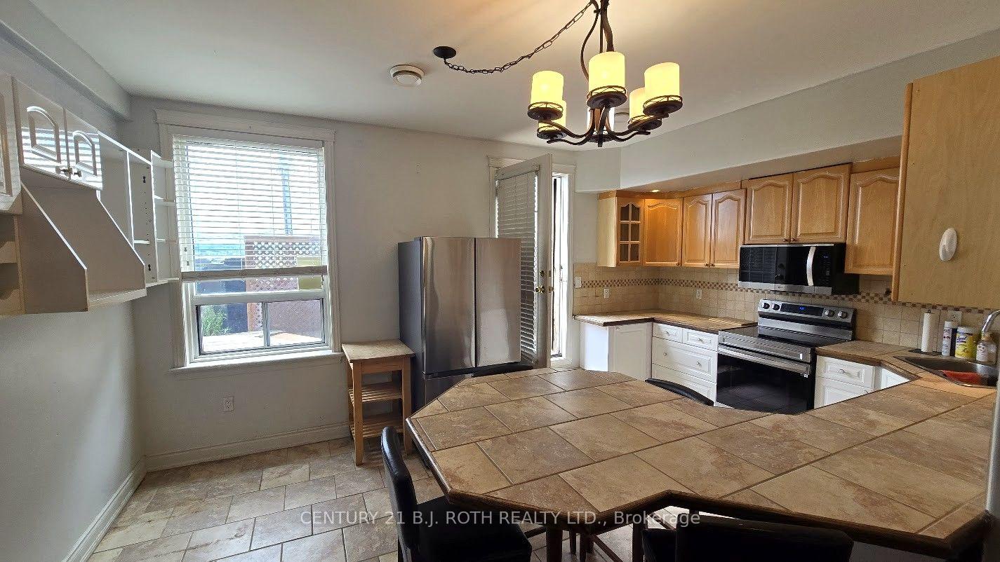 Photo 2 of Unit 1, 41 Dunlop Street E, Barrie, City Centre — HOMEH