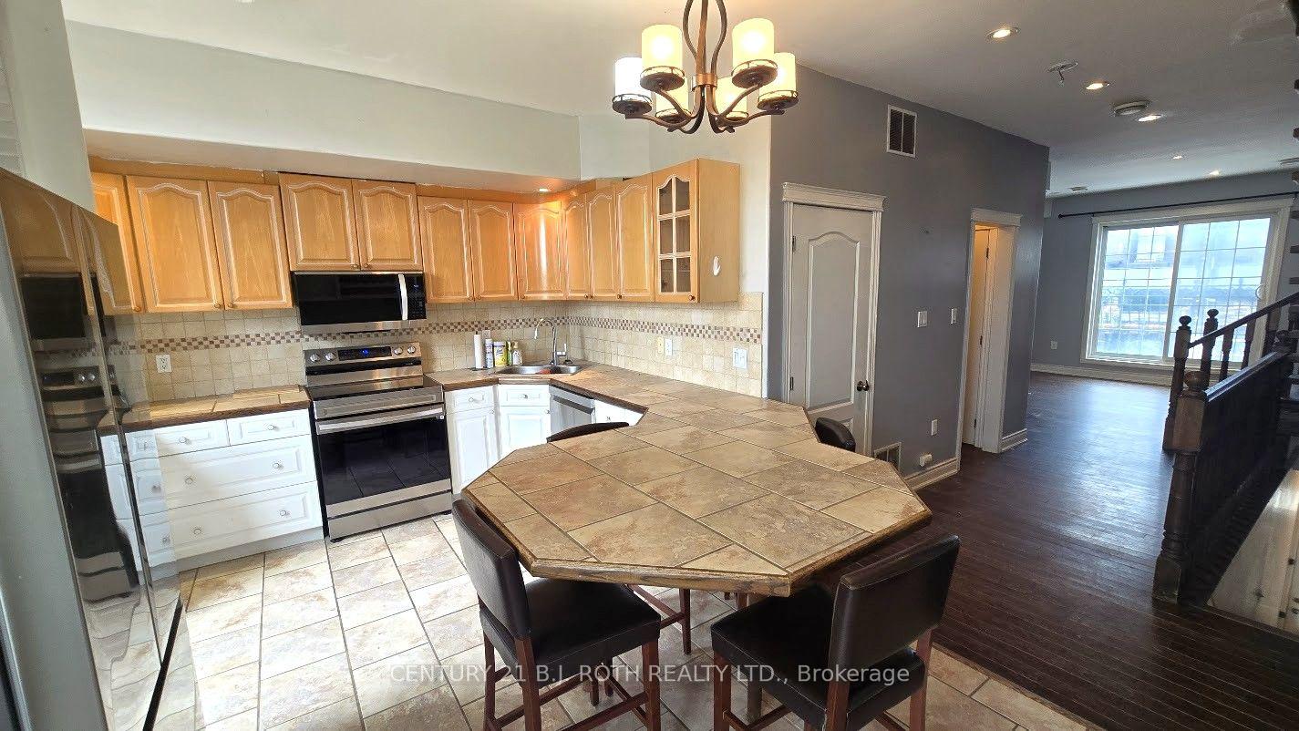 Photo 3 of Unit 1, 41 Dunlop Street E, Barrie, City Centre — HOMEH