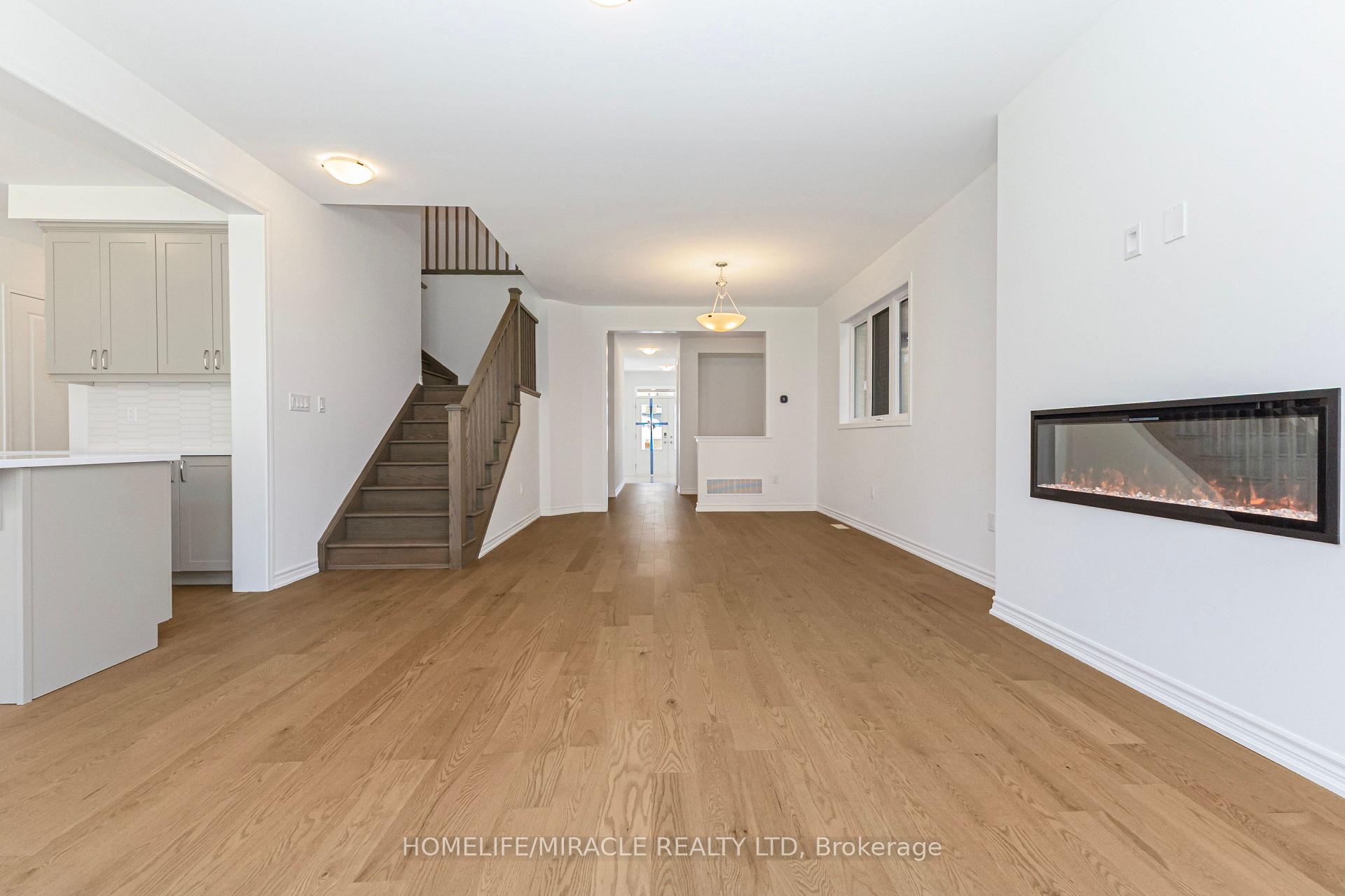 Photo 10 of 54 Gretzky Avenue, Barrie, Rural Barrie Southeast — HOMEH