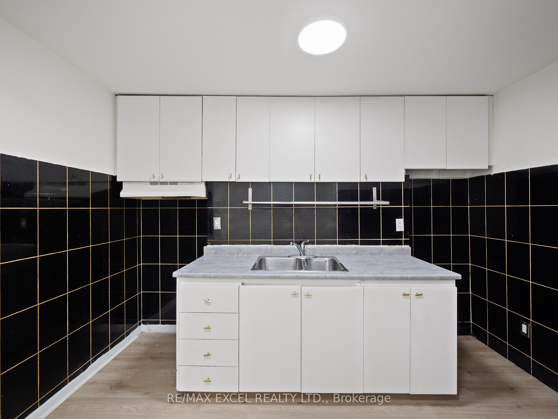 Photo 4 of Unit Bsmt, 137 Gerrard Street E, Toronto, Moss Park — HOMEH