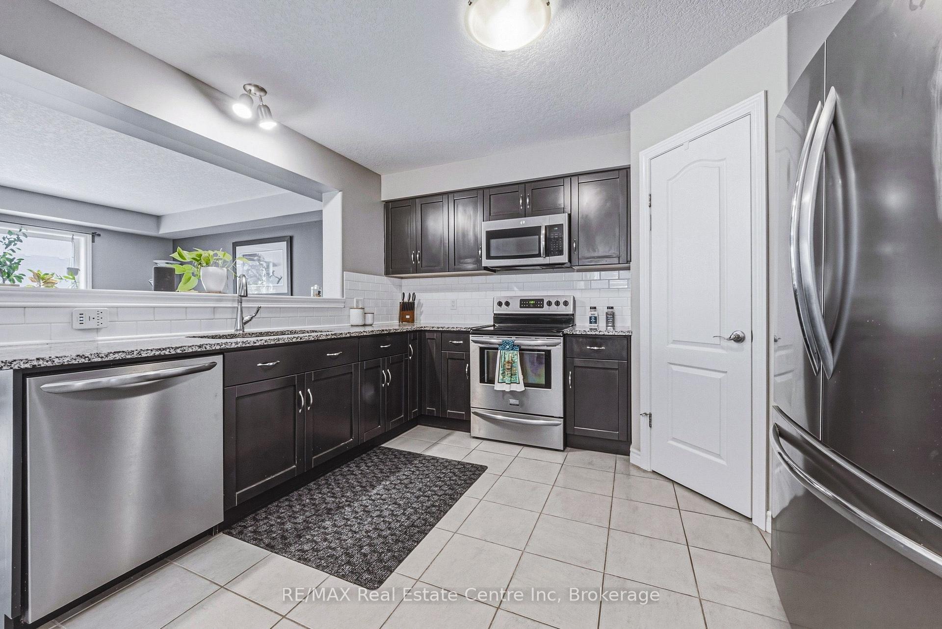 Photo 10 of 93 Couling Crescent, Guelph, Grange Road — HOMEH