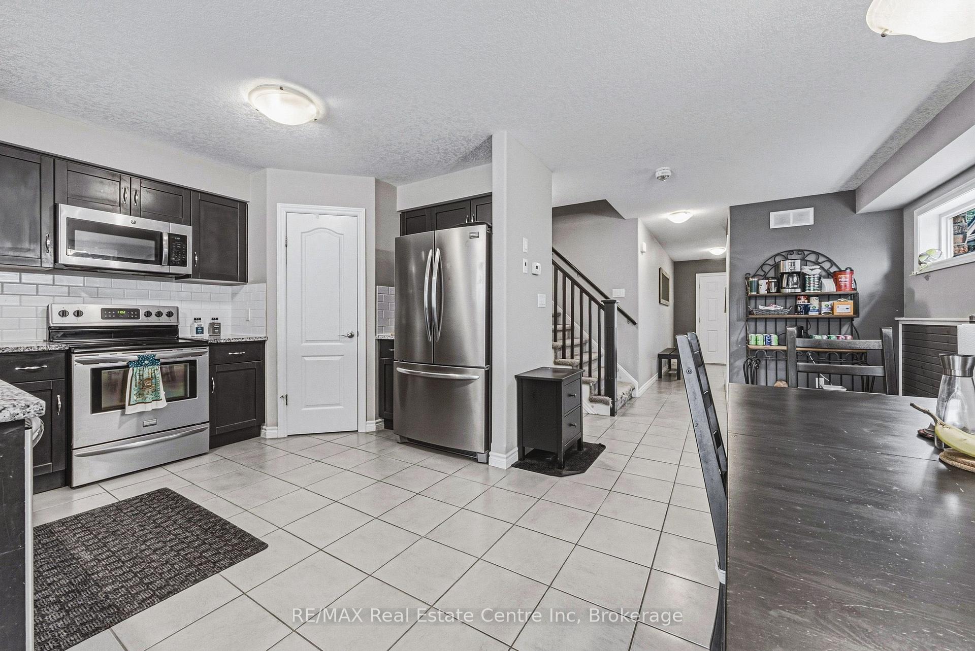 Photo 11 of 93 Couling Crescent, Guelph, Grange Road — HOMEH