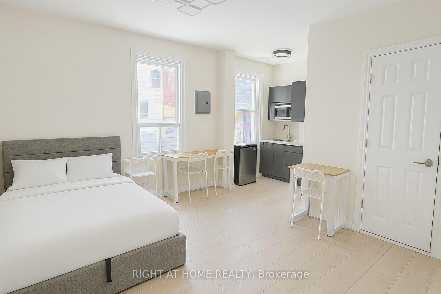 Photo 1 of Unit 202, 198-200 Queen Street W, Toronto, Kensington-Chinatown — HOMEH