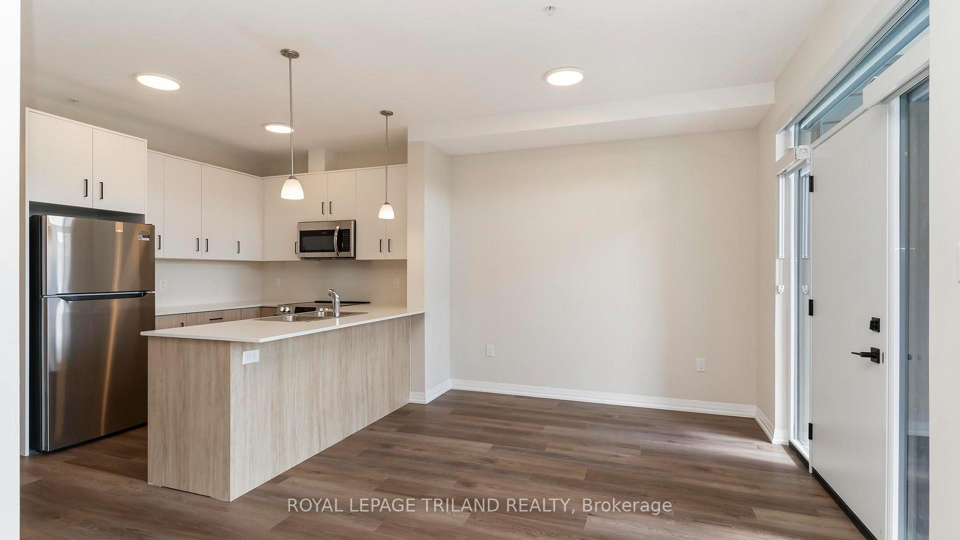 Photo 3 of Unit 101, 865 Kleinburg Drive, London, North B — HOMEH